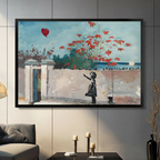 Framed street art impressionist oil painting black silhouette girl reaching up to release red heart balloon beside white stone wall with red flowering vines and ocean sailboat background canvas print on dark grey tile wall in modern living room - whimsical Banksy inspired girl with balloon wall art for contemporary home decor