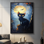 Spooky black cat with glowing eyes framed canvas wall art hanging in modern living room above candle holders — full moon and bat night scene