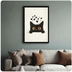 Framed black fluffy cat peeking over edge with floating hearts minimalist line art illustration above cream textured sofa on sage green wall – big orange eyes cream background cute cat canvas wall art for living room decor