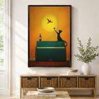 Framed black cat holding wine glass on teal piano wall art displayed above entryway console table in modern American home