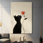 Unframed minimalist black cat and red flower canvas print on grey wall in contemporary living room - serene black cat silhouette looking up at single red bloom wall art with warm cream background for modern interior decor