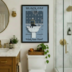Black Cat Sink Co Wash Your Paws framed canvas in marble bathroom with gold sconce round mirror and glass shower - vintage cat bathroom wall art with gothic typography steel blue background and brass faucet pedestal sink illustration