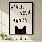 Funny black cat wash your hands framed wall art above minimalist white bathroom sink - humorous cat bathroom decor with bold hand-lettered typography