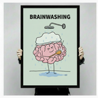 Hands holding a large black framed funny brainwashing brain shower canvas art print against a neutral gray background, front-facing product display