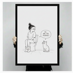 Funny cat bathroom wall art in black frame showing a girl on a toilet and a curious cat, styled in an elegant bathroom with marble countertop and gold brass fixtures