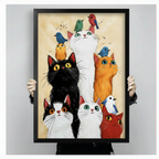 Hand-held black framed cats and birds art print showing artwork size, detail, and frame quality