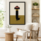 Quirky dachshund in red glasses and yellow bow tie framed canvas wall art beside white linen armchair in cozy Japandi-style reading nook