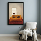 Atmospheric dachshund wall art in black frame hung on blue-grey wall beside white linen armchair in cosy reading nook setting
