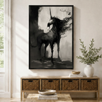 Dark gothic unicorn wall art print in black frame displayed above entryway console table with wicker baskets