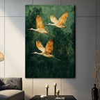 Three golden cranes in flight above emerald green forest canopy, edge-to-edge stretched canvas wall art in nature-inspired style for living room