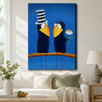 Stretched canvas wall art of a charming folk art romantic crow couple print featuring two round dark navy blue cartoon crows sitting together on a warm amber branch gazing at each other tenderly, one wearing a tall black and white striped stovepipe top hat and the other clutching a single white daisy, both with broad golden yellow beaks and white eye rings on a deep cobalt blue night sky background dotted with tiny gold sparkles, hung above a white sofa with a sage green pillow and cream throw in a bright a