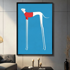 Black framed funny greyhound dog in red sweater canvas wall art with bright blue background displaye