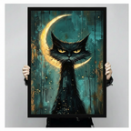 Hands holding a large black framed gothic black cat with crescent moon canvas art print with a fierce brooding black cat with piercing amber eyes and wild spiky fur set against a luminous golden crescent moon on a deep teal and dark gold drip-textured background with gold star splatter