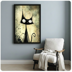 Black framed Tim Burton style black cat canvas print hung on a soft blue-gray wall beside a white linen armchair with a cream knit throw blanket draped over the arm