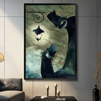 Black framed canvas print of gothic dark figure with top hat and glowing street lantern, displayed on dark wall above console table