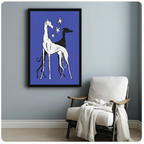 Black framed wall art print of two greyhounds and stars on blue background, styled beside white linen armchair

