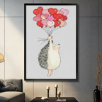 Framed wall art print of a cute hedgehog floating with red and pink heart balloons on a white background, displayed in a modern dark living room