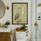 Black framed vintage heron with toilet paper roll art print above toilet in luxury marble bathroom with gold fixtures and plants
