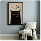 Framed I'm Fine smoking black cat wall art beside wooden accent chair with linen throw - dark humor cat illustration canvas print with handwritten typography for reading nook