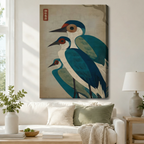 Teal blue heron trio Japanese art canvas print hung above white sofa in bright Scandinavian living room