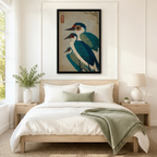 Japanese folk art teal heron trio black framed print above neutral linen bed in serene Scandinavian bedroom