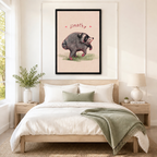 Large framed Jimothy opossum poster hung as bedroom wall art above a low oak bed with white linen and sage green throw in a serene Japandi-style room with warm neutral tones