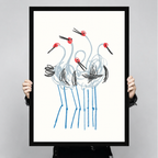 Large red-crowned crane line drawing art print with black frame held up for size reference, bold sketch style oriental bird poster