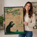 Woman holding large framed otter drinking tea Japanese style art print showing print size and detail quality