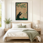 Japanese woodblock style otter with green tea cup framed wall art above bed in minimalist Scandinavian bedroom