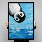 Person holding large framed penguin oil painting print showing full detail of upside-down penguin over Antarctic iceberg seascape