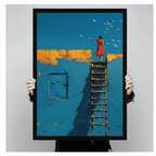  Hand-held black framed poster print of surrealist oil painting featuring woman in flowing red dress atop ladder on blue wall with golden horizontal beam and white birds flying overhead