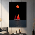 Stretched canvas print of a bold red sailing boat beneath a vivid orange moon on a dark navy ocean with shimmering reflection, gallery-wrapped and hung in a contemporary grey living space