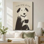 Gallery wrapped canvas print featuring an abstract brushstroke dog with coffee mug and "rise and shine" quote, hung above a white sofa in a cozy living room