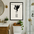 Humorous sloth with toilet paper and Take Your Time quote, black framed funny bathroom art print above toilet in elegant marble and gold bathroom