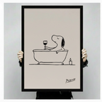 Hands holding large framed Snoopy bathtub line art canvas - full artwork detail view of minimalist dog wall print with Picasso signature