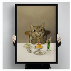Tabby cat with big eyes sitting before cafe desserts and drinks, premium framed canvas art print held up showing full artwork detail