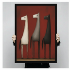 Close-up of a premium art print showing three whimsical elongated horses on a dark red background, held by hands to showcase print quality and detail