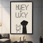 Framed sketch art print of two dogs Huey and Lucy displayed in dark modern living room with candlestick decor