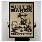 Person holding a large framed canvas featuring bold western-style typography and a detailed sketch of a cowboy washing hands, showcasing the tan background and black frame quality
